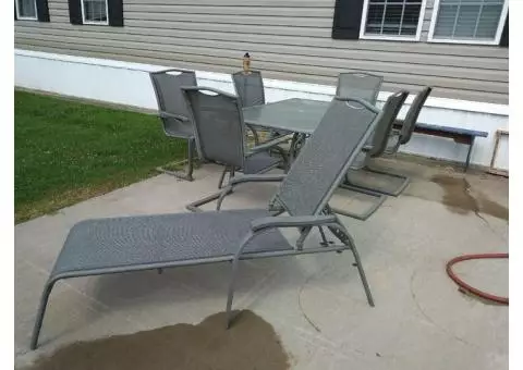 Patio set with six chairs and lounger